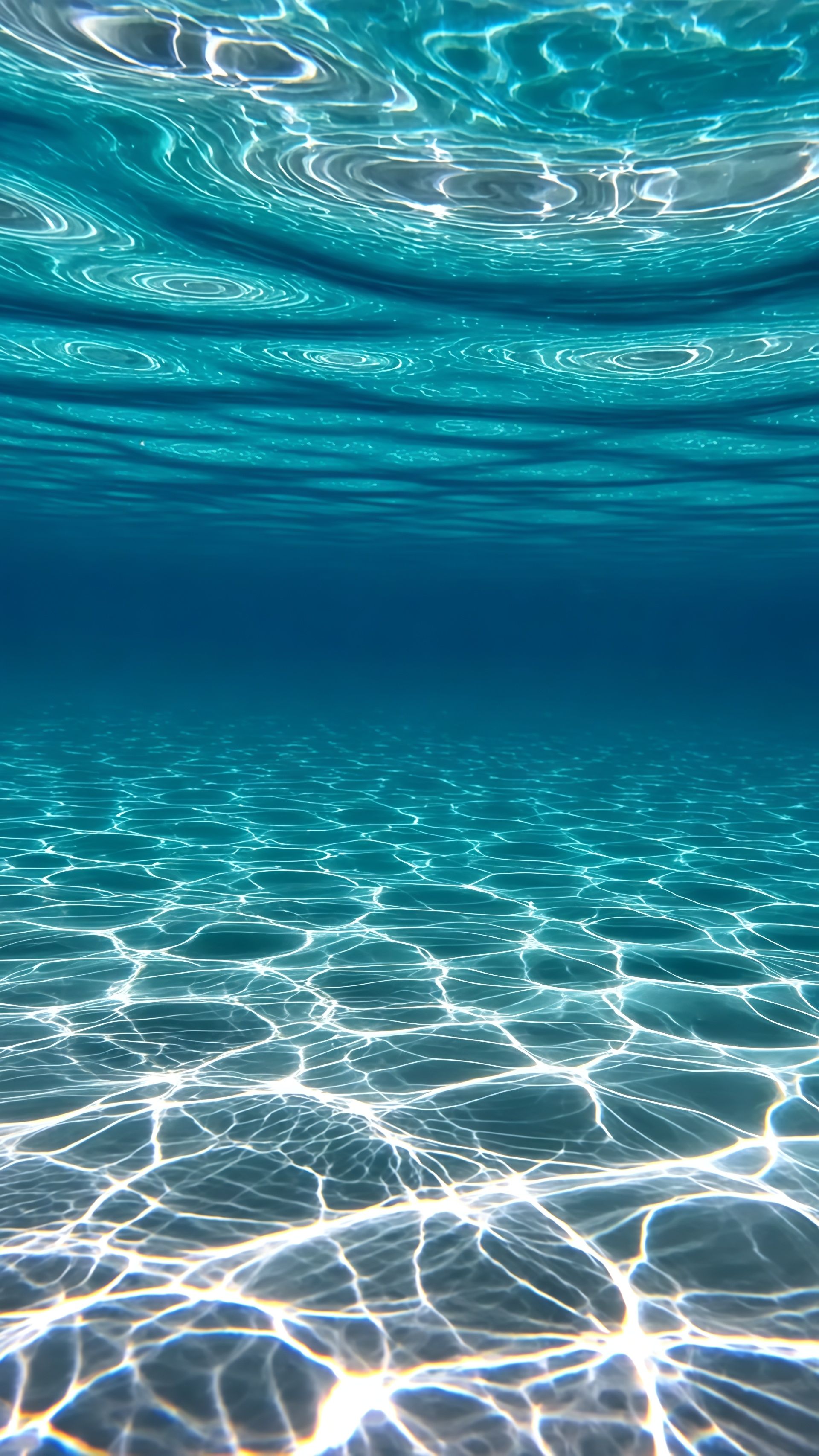 Clear Underwater Ocean Sun Light Rays Wallpaper 6 iphone_14_pro