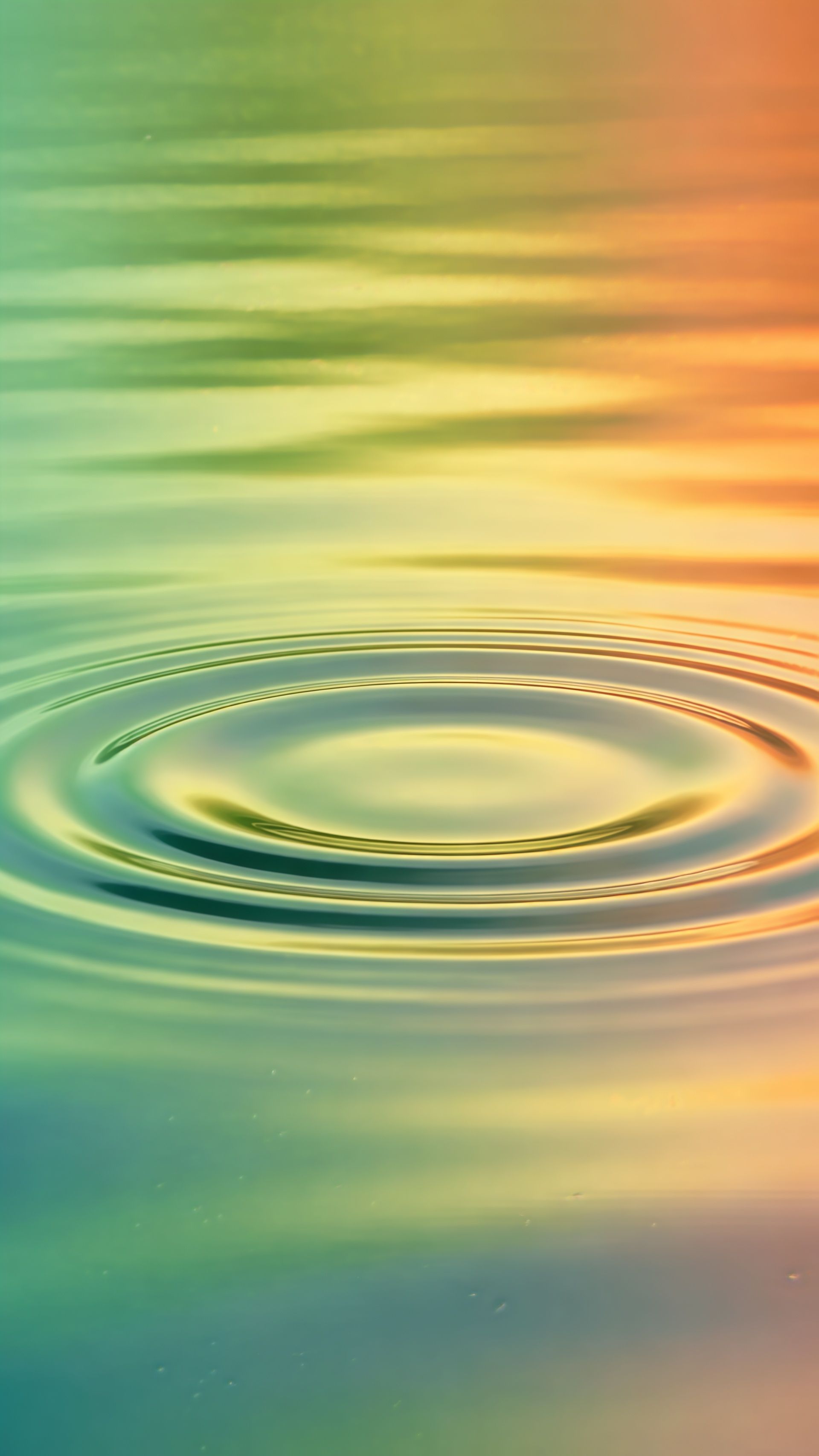 Vibrant Water Ripple Concentric Circles Wallpaper 6 iphone_14_pro